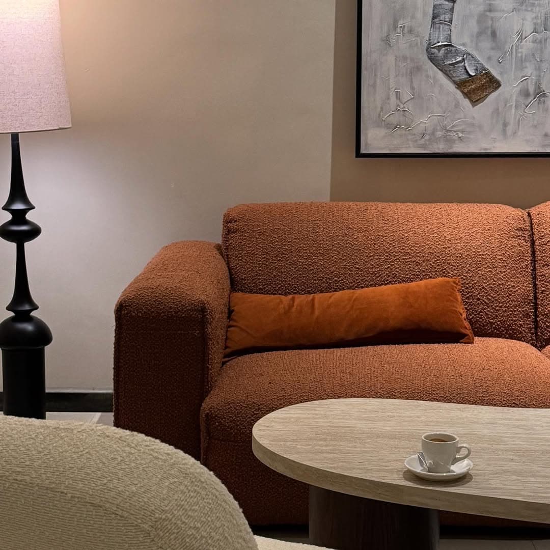 Trove Cafe lounge with cream seating and modern warm interiors
